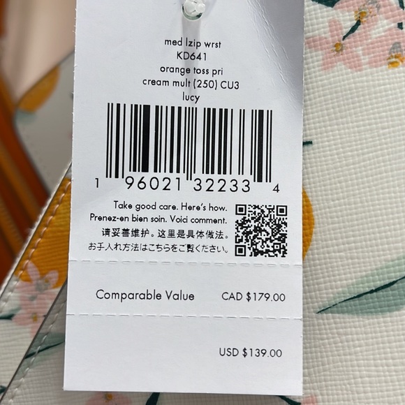 Kate Spade Lucy Orange Toss Printed Medium L-Zip Wristlet
Cream Multi
NWT - Picture 5 of 16